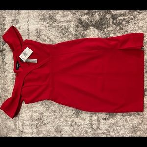 Red off the shoulder dress.